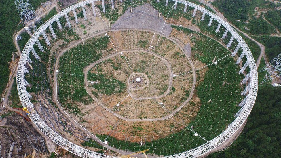 This file picture taken on July 29, 2015 shows the 500-metre Aperture Spherical Radio Telescope (FAST) under construction in Pingtang, in south-west China's Guizhou province.