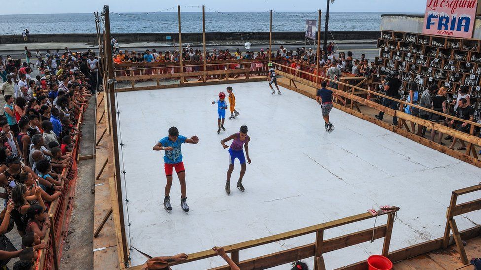Cubans skate in an artificial ice rink in Havana, on May 24, 2015.