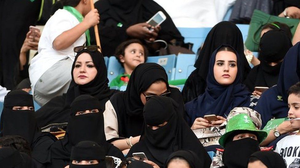 Saudi women sit in a stadium to attend an event in the capital Riyadh on 23 September