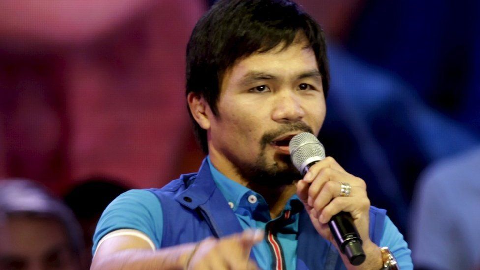 Filipino boxer Manny Pacquiao, who is running for Senator in the May 2016 vice-presidential election, speaks to supporters during the start of national elections campaigning in Mandaluyong city, Metro Manila 9 February 2016.