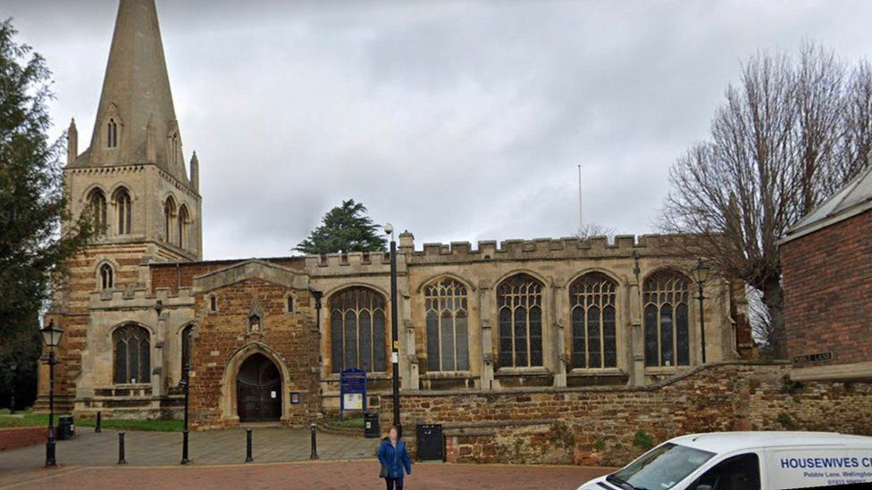 Stone church building with spire