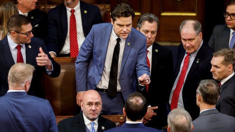 Matt Gaetz gestures to lawmakers on Wednesday