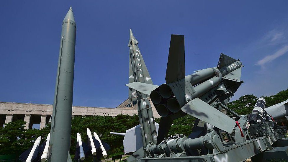Replicas of a North Korean Scud-B missile (L) and South Korean Nike missiles are displayed at the Korean War Memorial in Seoul on July 19