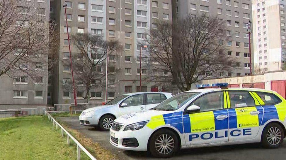 Police outside the High Coats Flats in Coatbridge