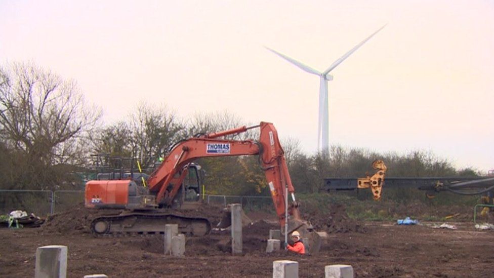 World's tallest wooden wind turbine starts turning - BBC News