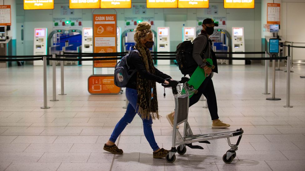 Passengers checking in at Gatwick