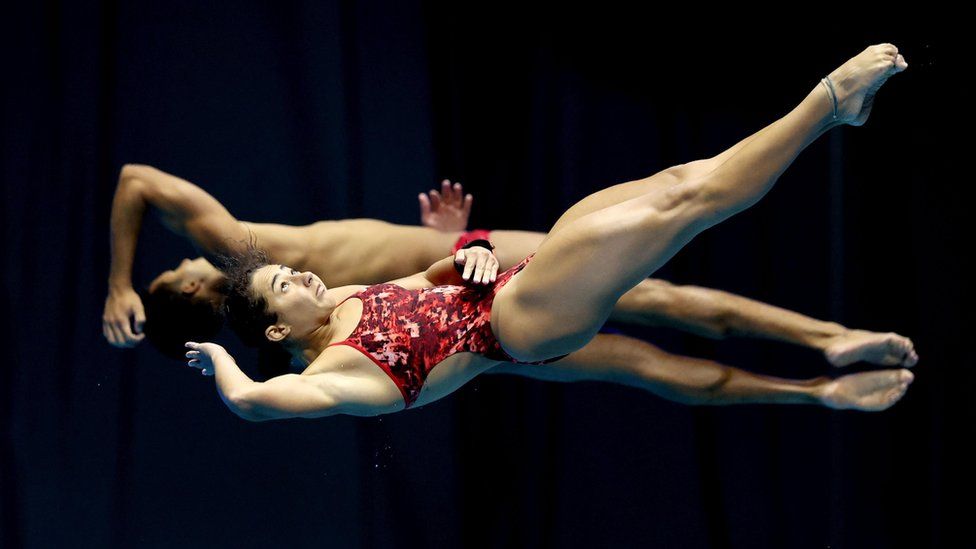 Two synchronised divers on 23 July 2023