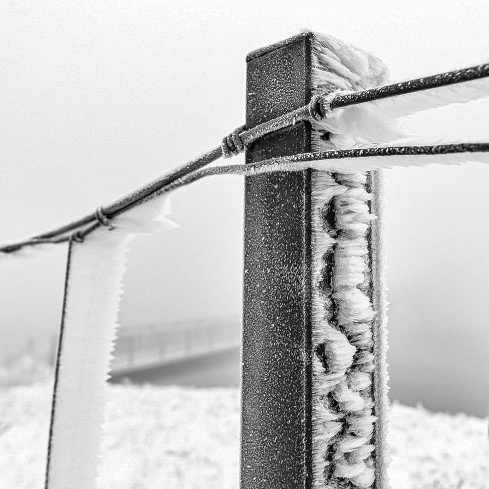 Ice on a fence and post on the Pennine Way, Saddleworth Moor.