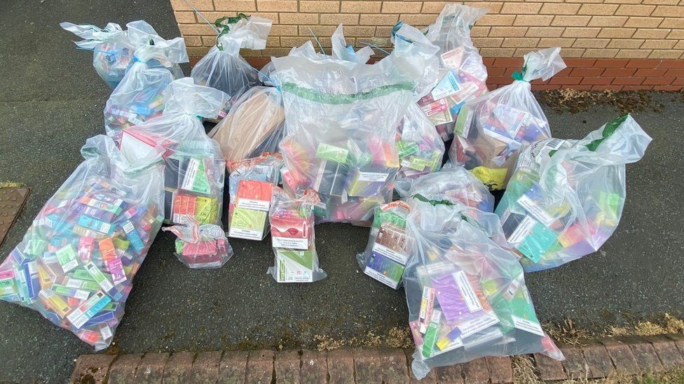 Hundreds of seized vapes collected in plastic bags