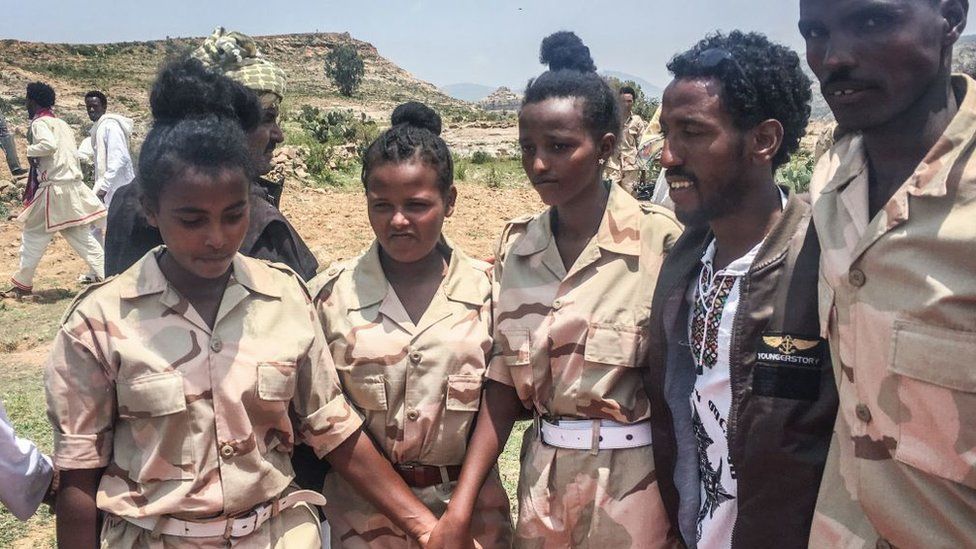 Eritrean soldiers react on September 11, 2018 in Serha, Eritrea, as two land border crossings between Ethiopia and Eritrea were reopened for the first time in 20 years in Serha
