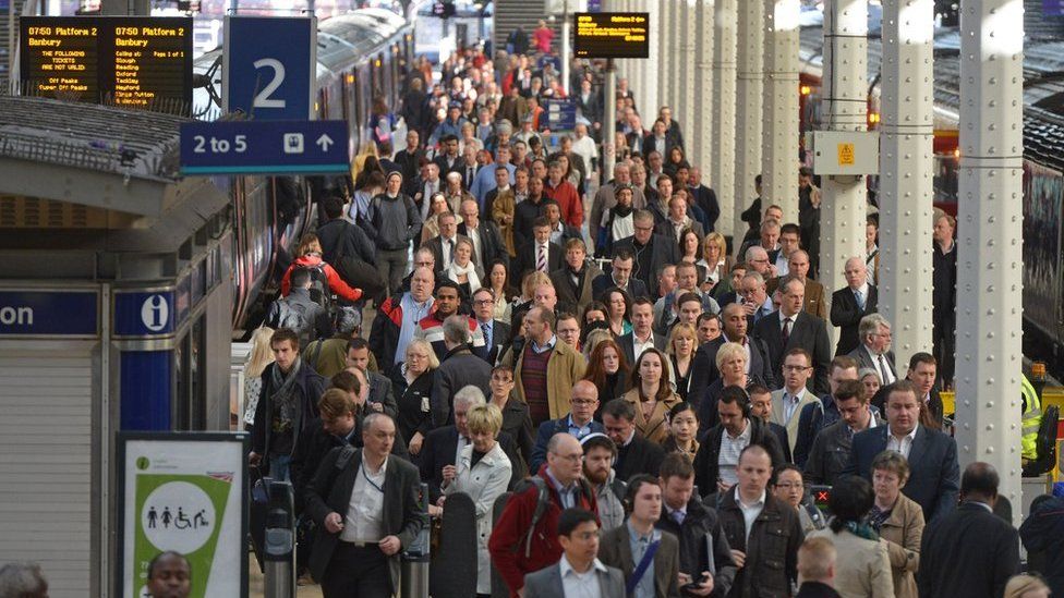 Commuters at Paddington station in London