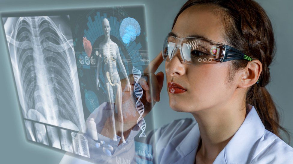 Futuristic doctor looking at body scan