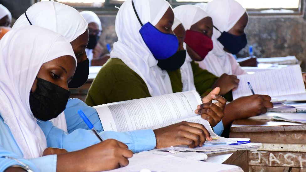 Students of Kakungulu Memorial Secondary school attend a class, after schools reopened following the coronavirus disease (COVID-19) induced shutdown, in Kibuli suburb of Kampala, Uganda, January 10, 2022