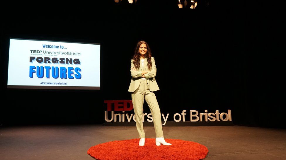 Maya Raichoora delivering a TedX talk