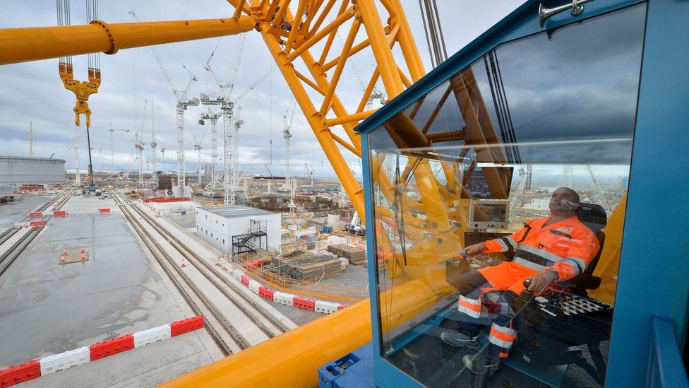 Crane operator Martin Redmond inside his cab on board "Big Carl"