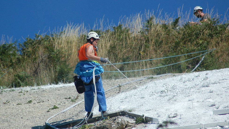 Contractors at work on the famous Yorkshire landmark