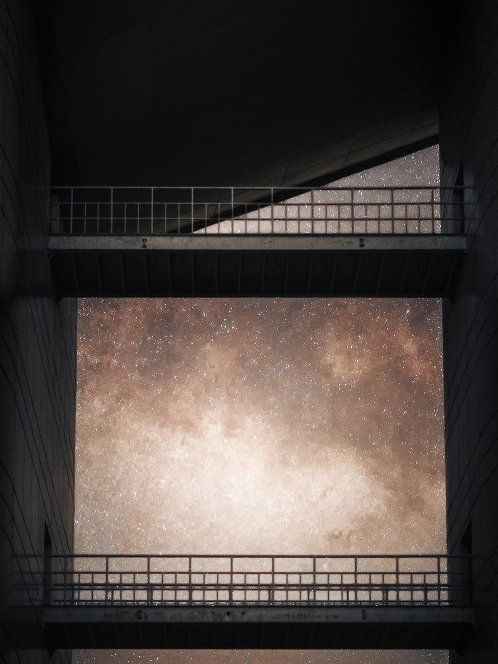 The milky way viewed through the minimalist outdoor passageway at the National Astronomical Observatory of China