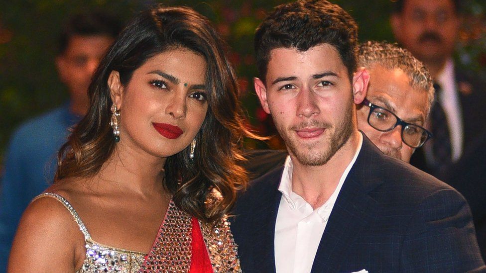 Priyanka Chopra and Nick Jonas arriving at a party together in June