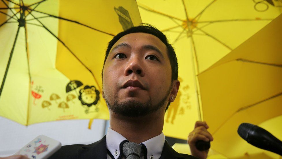 Political activist Ken Tsang addresses the media outside the Kowloon city court in Hong Kong on 26 May 2016