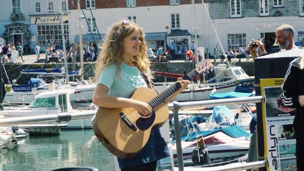 Daisy busking in Padstow