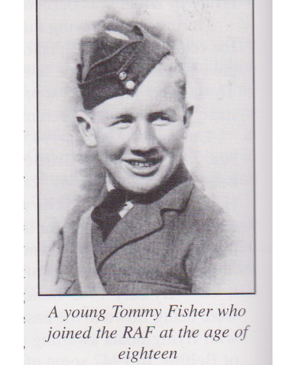 A young Tommy Fisher dressed in an army uniform