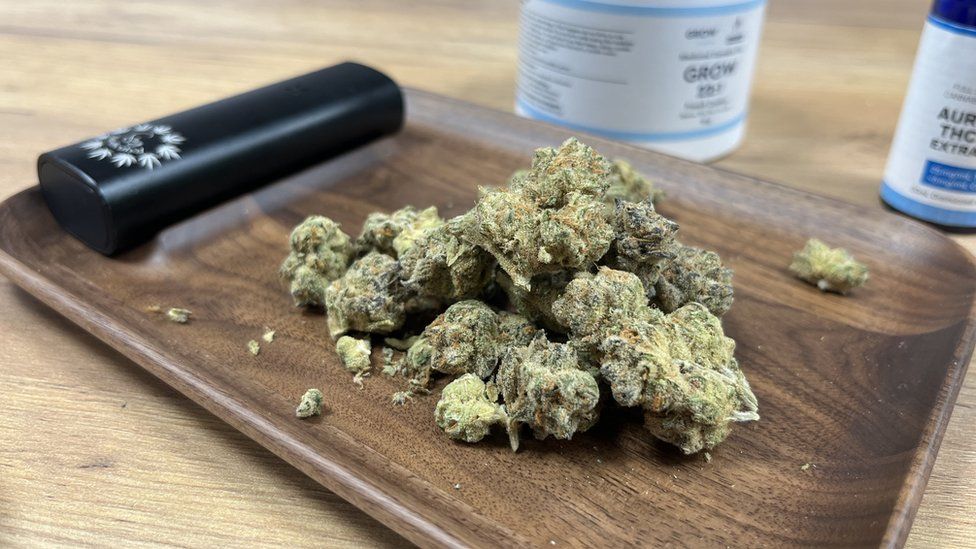 Medical cannabis on a board next to a vaporiser