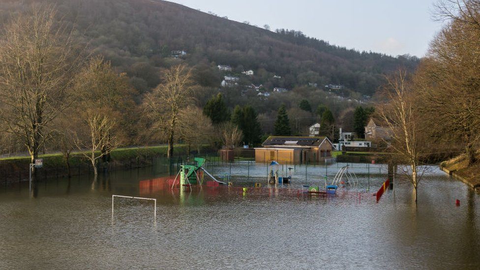 TAFF’S WELL, WALES - JANUARY 12: A general view of a flooded playground on January 12, 2022, in Taff’s Well, Wales. The Met Office has flood warnings and alerts in place for large parts of the UK for this week. There have been specific warnings for the South West, Oxfordshire and Wales in from Wednesday evening until Thursday afternoon. (Photo by Matthew Horwood/Getty Images)
