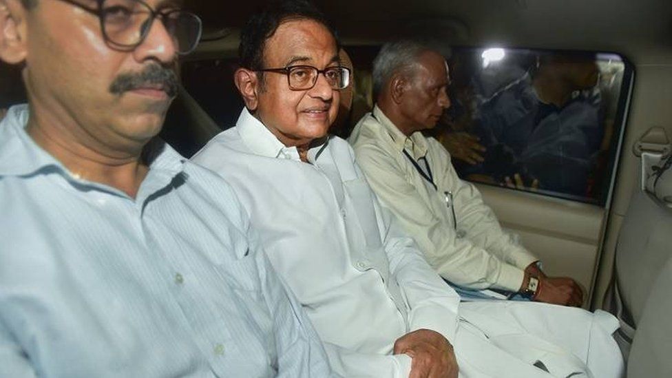 The CBI team leaves with Chidambaram from his Jor Bagh residence in New Delhi Wednesday night