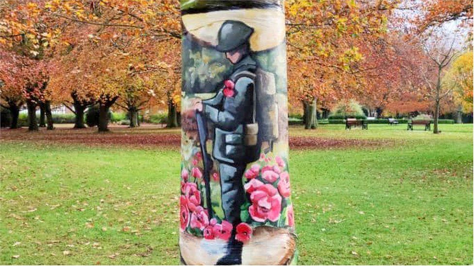 A soldier painted on a tree