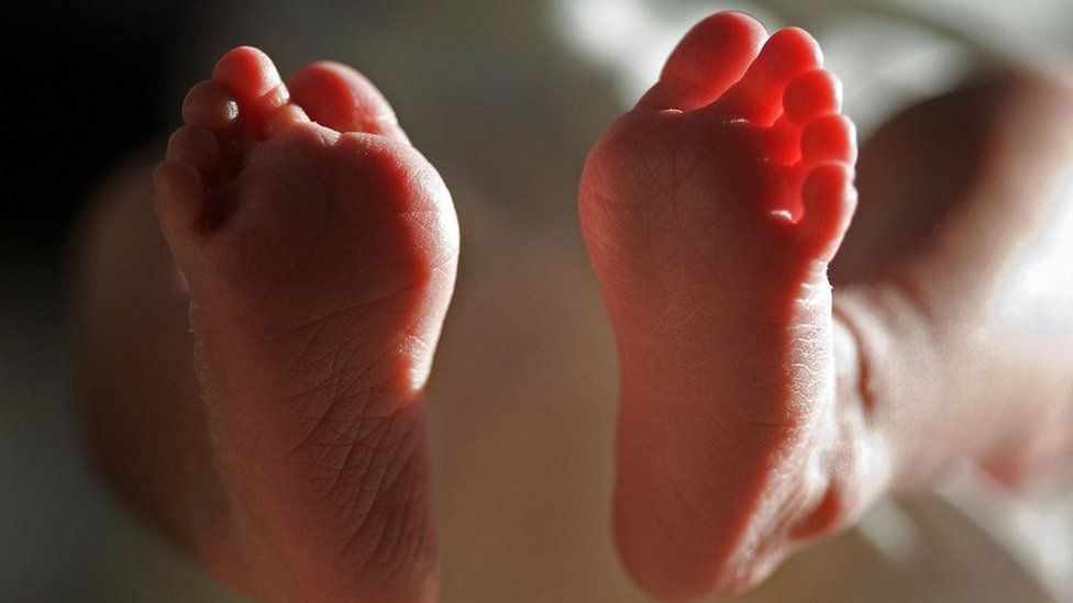 Close-up of a newborn baby's feet