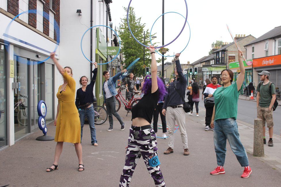 Hula hoopers on Mill Road, Cambridge