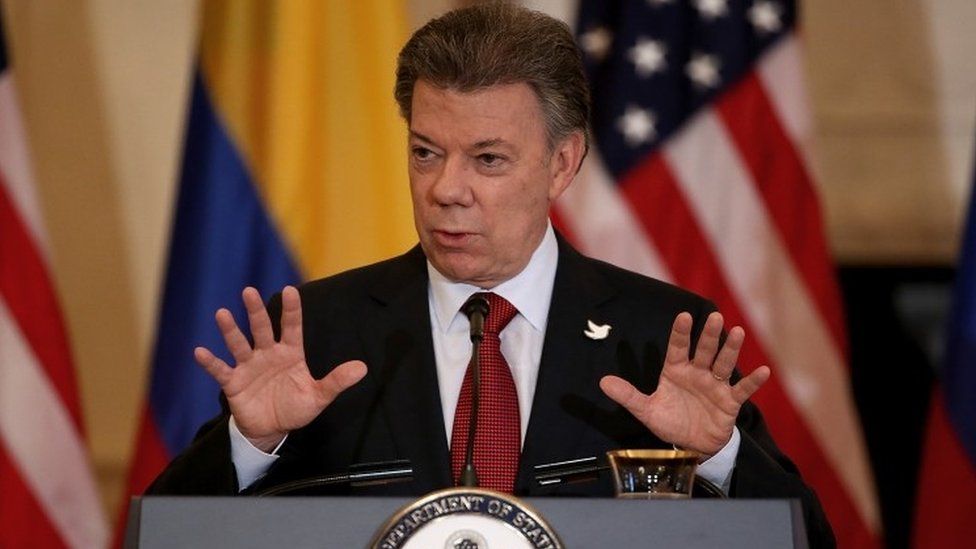 Colombian President Juan Manuel Santos answers a question during a joint press conference with U.S. Secretary of State John Kerry at the State Department on February 5, 2016 in Washington,