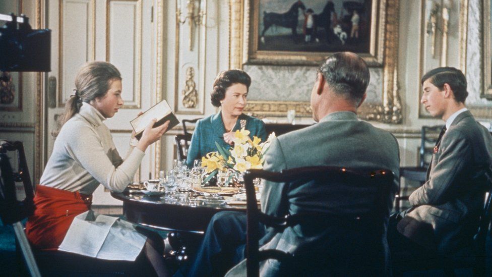 Queen Elizabeth II is filming lunching with Prince Philip and their children Princess Anne and Prince Charles at Windsor Castle in around 1969