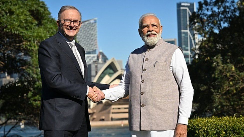Prime Minister Narendra Modi (R) with Australia's Prime Minister Anthony Albanese in front of the Sydney Opera House