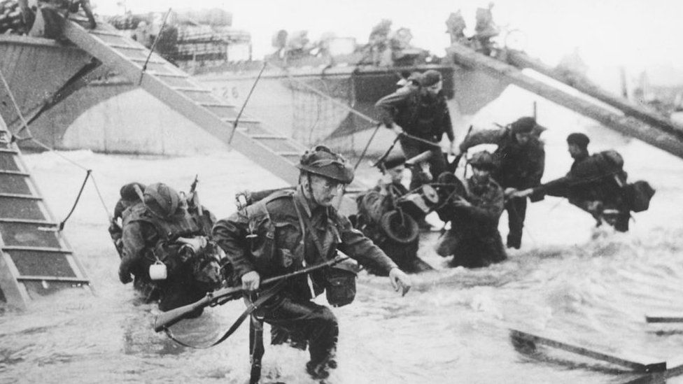 Troops from the 48th Royal Marines at Saint-Aubin-sur-mer on Juno Beach, Normandy, France, during the D-Day landings, 6th June 1944.