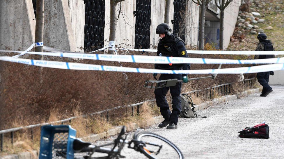 The police has cordoned off and investigates the area outside Varby Gard metro station south of Stockholm where two people were injured in an explosion on January 7, 2018.