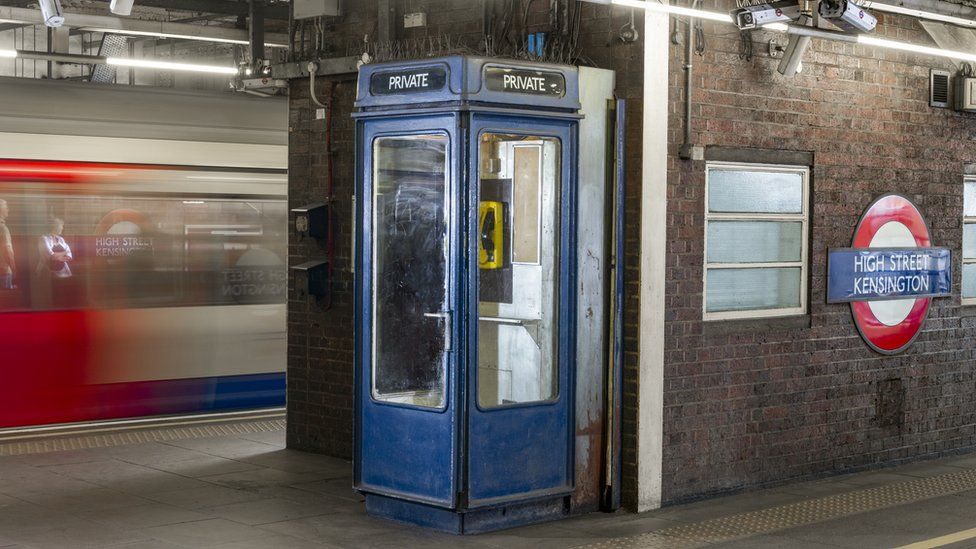 One of the iconic K8 phone boxes at High Street Kensington station