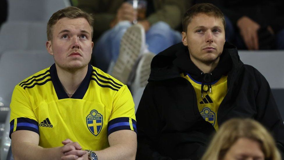 Swedish fans wearing national team t-shirts