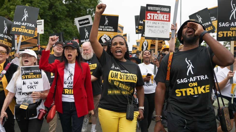 US actor Sheryl Lee Ralph (C) and SAG-AFTRA LA President Jodi Long (CL) join members of both WGA (Writers Guild of America) and SAG-AFTRA (Screen Actors Guild and American Federation of Television and Radio Artists) on a march from Netflix to Paramount Studios in Los Angeles, California, USA, 13 September 2023