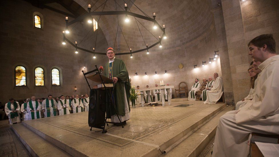 The President of the German Association of the Holy Land (DVHL), Cardinal Rainer Maria Woelki (C), leading a Holy Mass, at the Church of Loaves and Fishes, in Tabgha