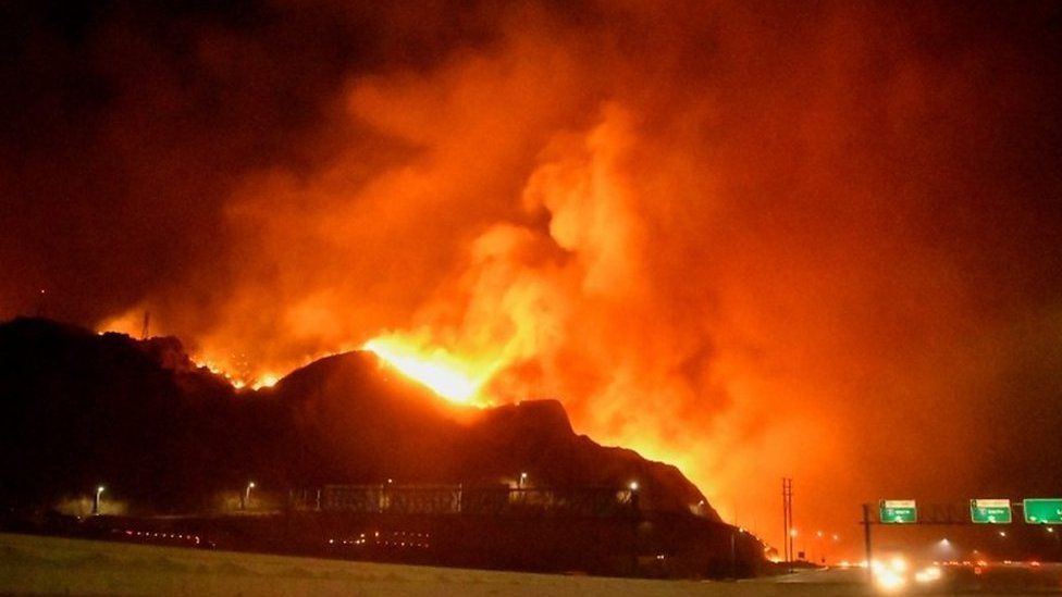 The wildfire burning in the Sylmar neighbourhood of Los Angeles