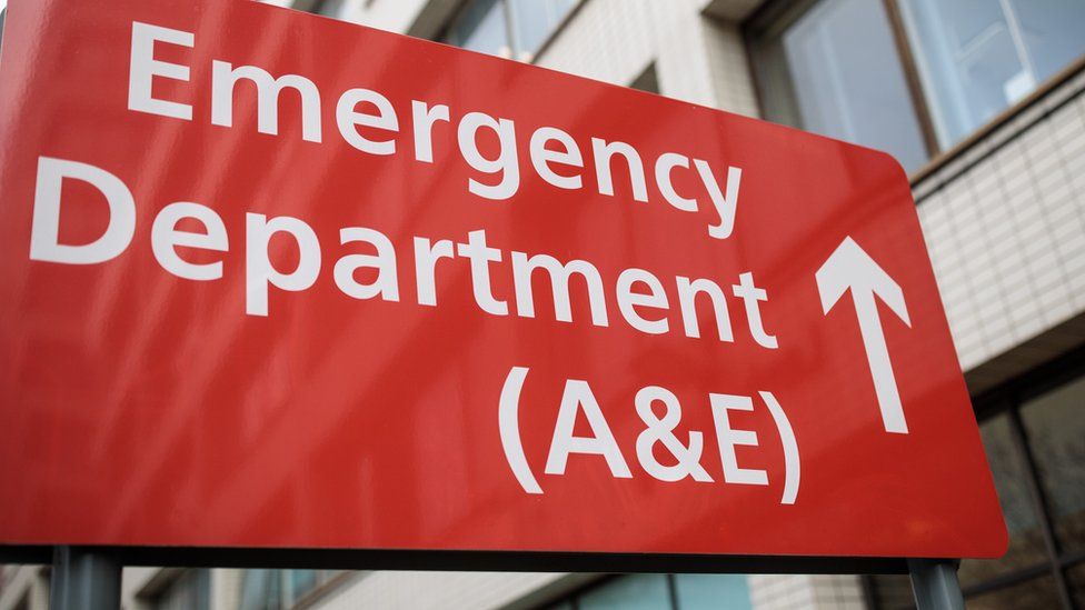 Emergency department sign directing to A and E