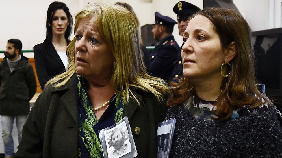Relatives react to the sentence read by the judges of the Third Court of Rome during the trial of South American military officers and civilians accused of collaborating in the forced disappearances and murder of Italian nationals in Rome on January 17, 2017.