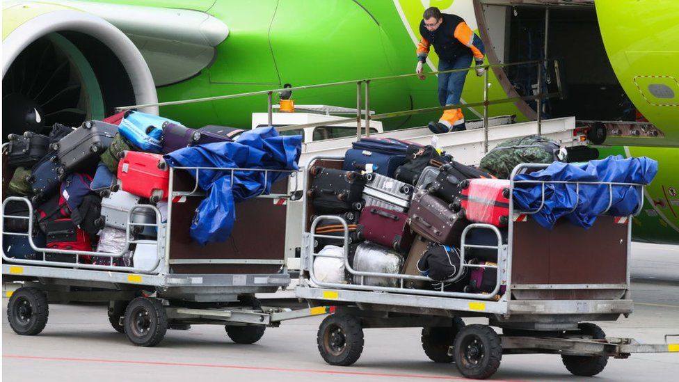 Checked baggage loaded into an airplane of the Rossiya Airlines at St Petersburg's Pulkovo International Airport