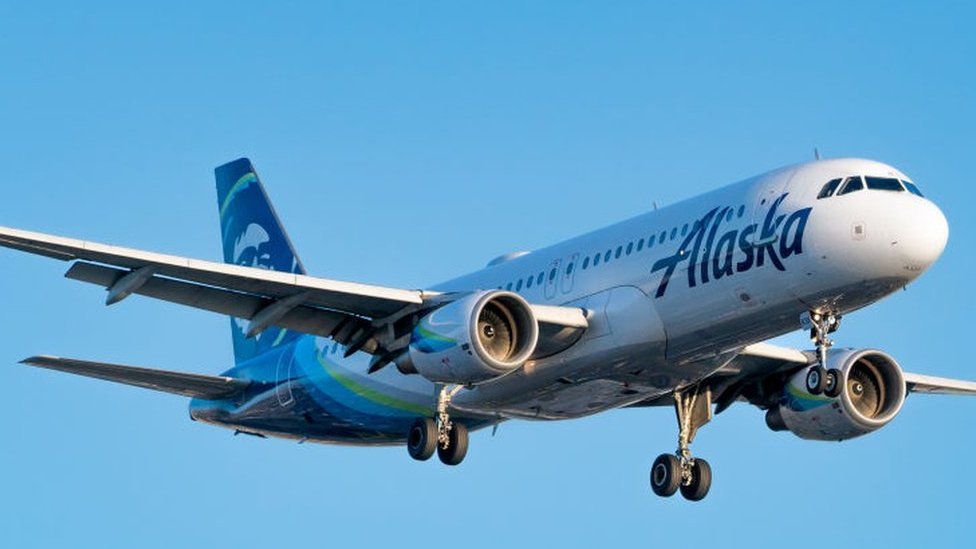 стоковое изображение рейса авиакомпании Alaska Airlines