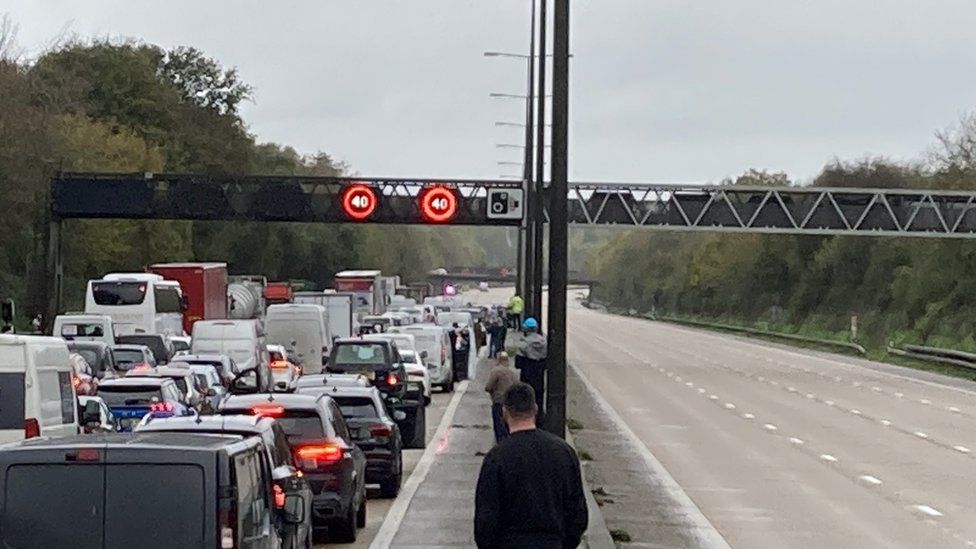 Traffic builds up as Just Stop Oil stage a protest at junction 7 of the M25