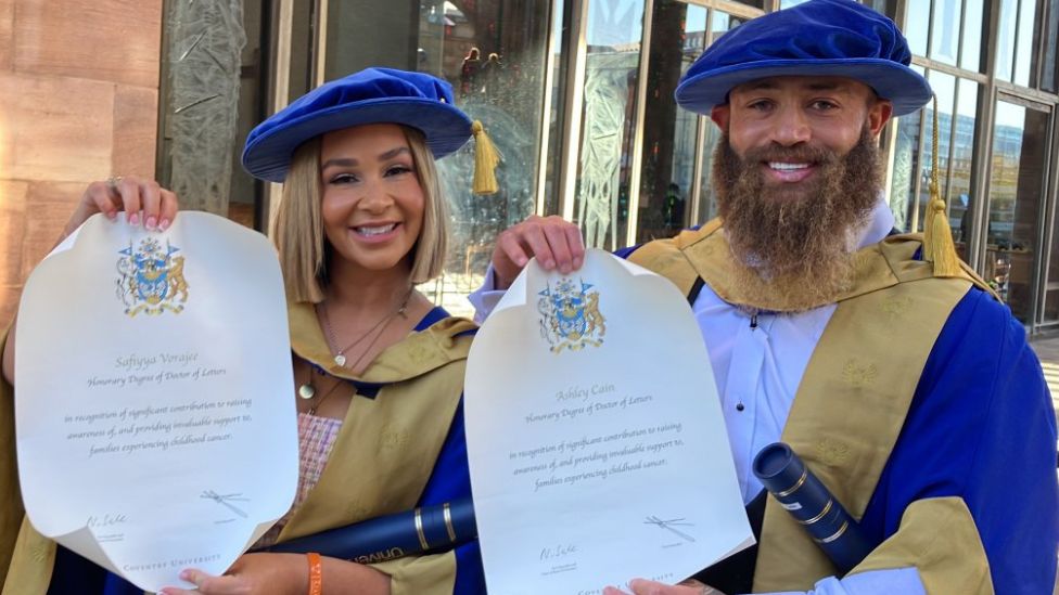 Safiyya Vorajee and Ashley Cain with their honorary degrees