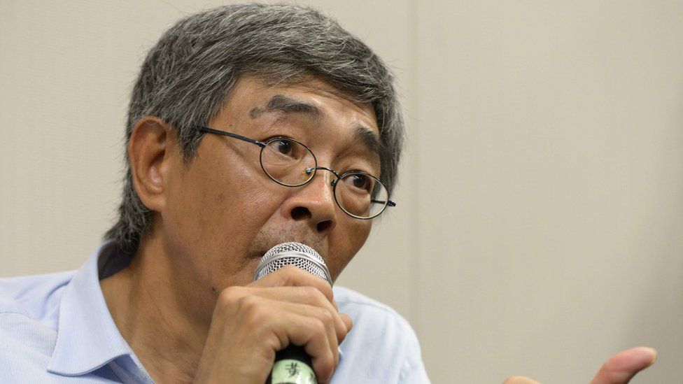Previously missing Hong Kong bookseller Lam Wing-kee gestures as he holds a press conference with local lawmaker Albert Ho at the Legislative Council in Hong Kong on June 16, 2016.