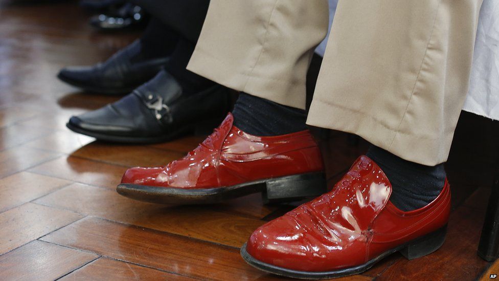 A contestants shiny red shoes at Sao Paulo's "Most Handsome Elderly Male" contest