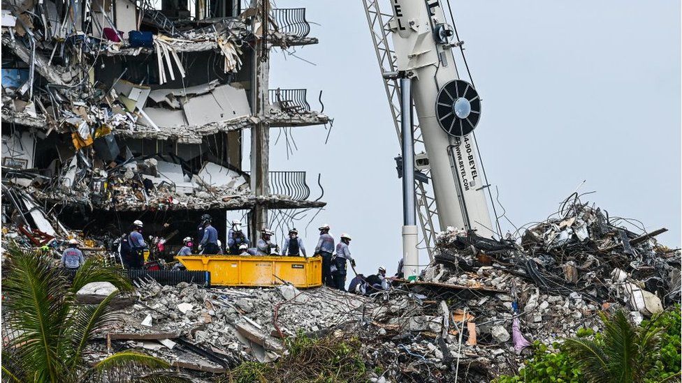 Search and Rescue teams look for possible survivors in the partially collapsed 12-story Champlain Towers South condo building on June 29, 2021 in Surfside, Florida.